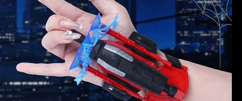 Spider web shooter toy worn on a wrist