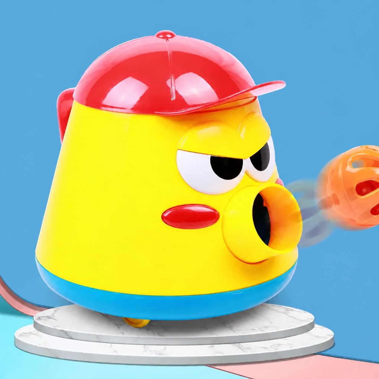 Yellow ball-launching toy close-up