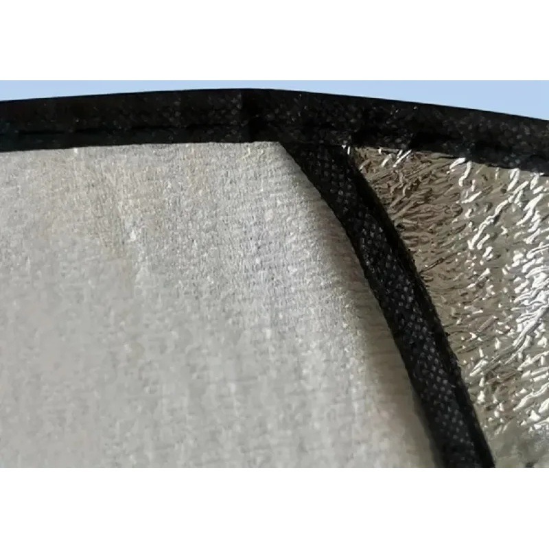 Close-up of steering wheel sun shade cover edging and reflective material