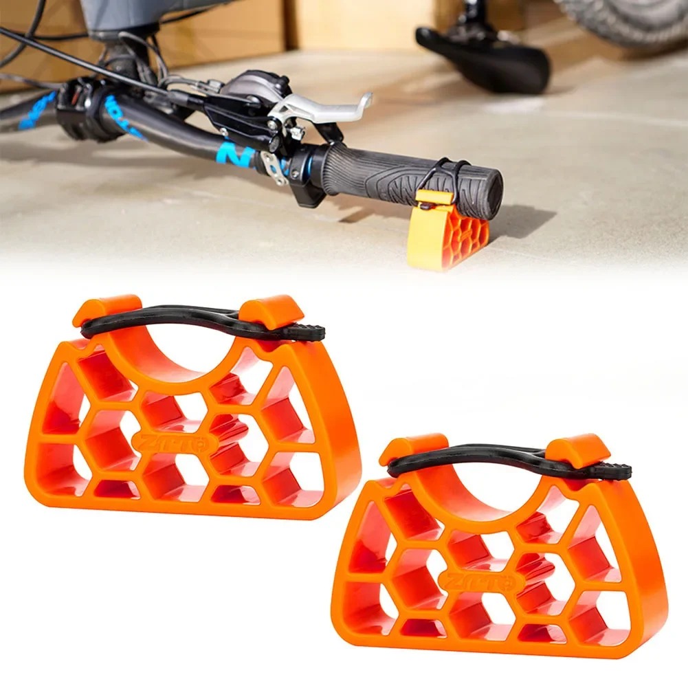 Bike handlebar stabilizer stands shown with a bicycle handlebar