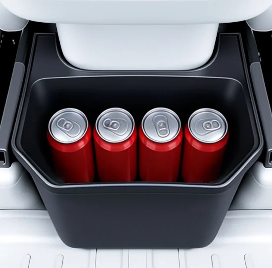 Rear centre-console storage bin holding four drink cans