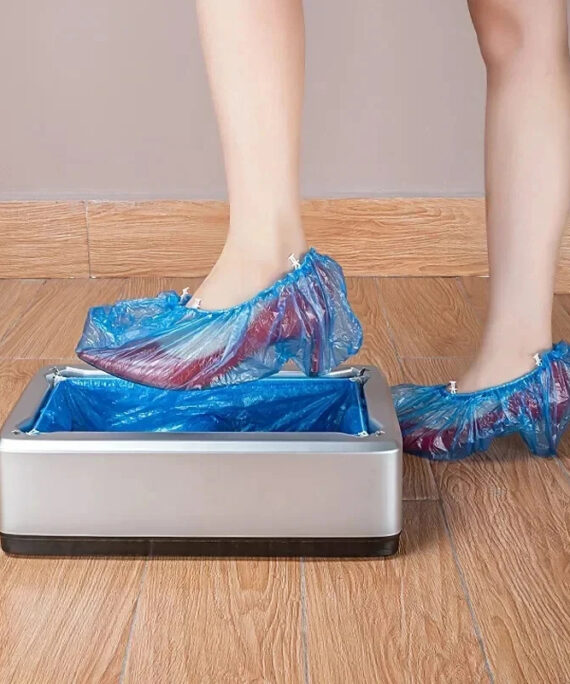 Automatic shoe cover machine
